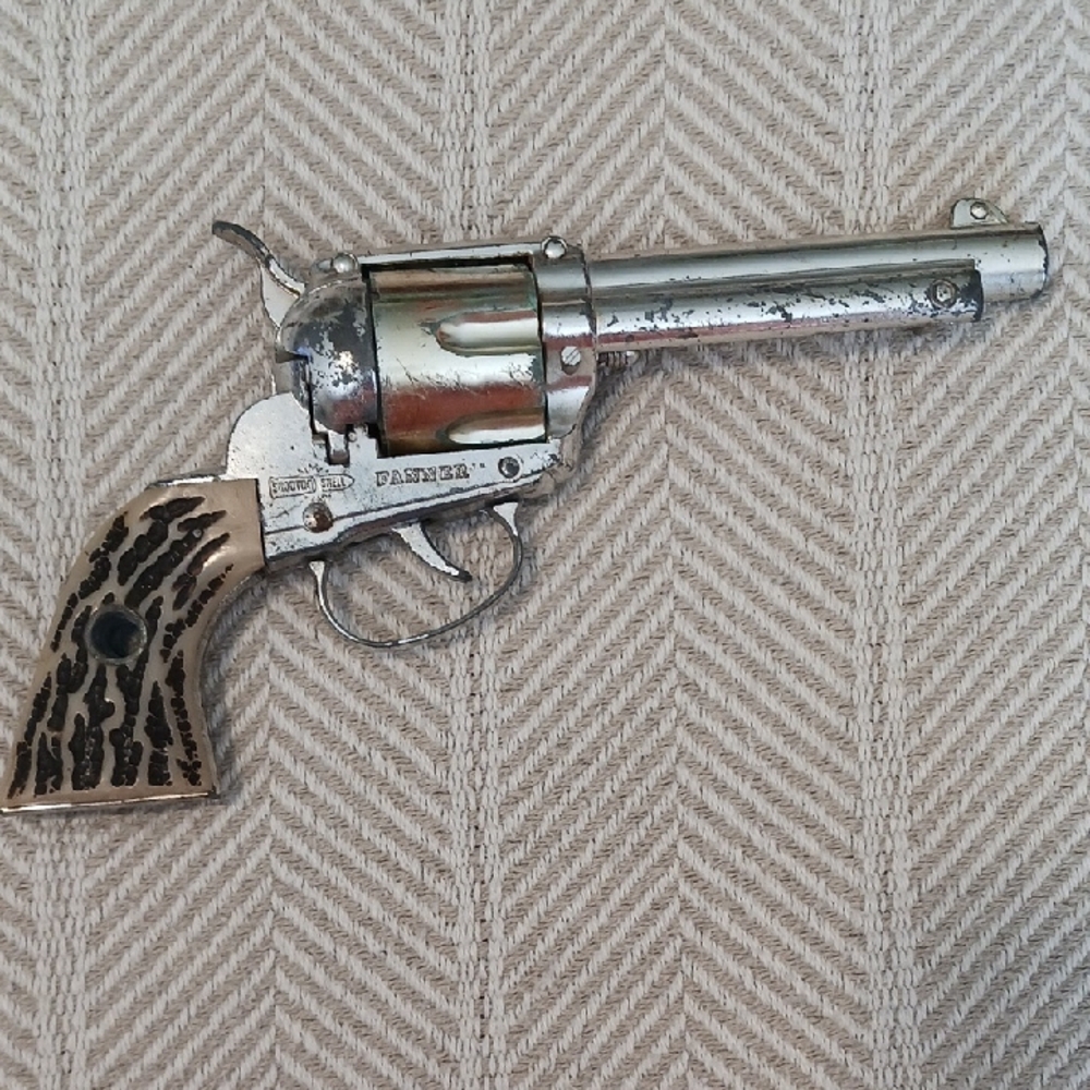 Silver and Brown Toy Revolver